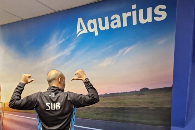 Aquarius IT Staff Member Wearing Sub Pool Shirt