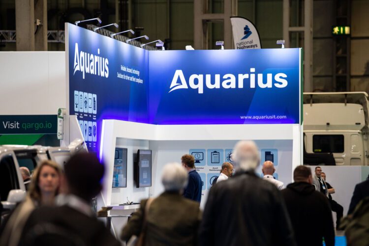 Blue Aquarius IT Stand At A Transport Trade Show